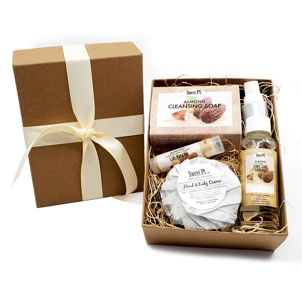 almond scented organic skincare set includes: soap, lip balm, dry oil spray and hand and body cream. cruelty free