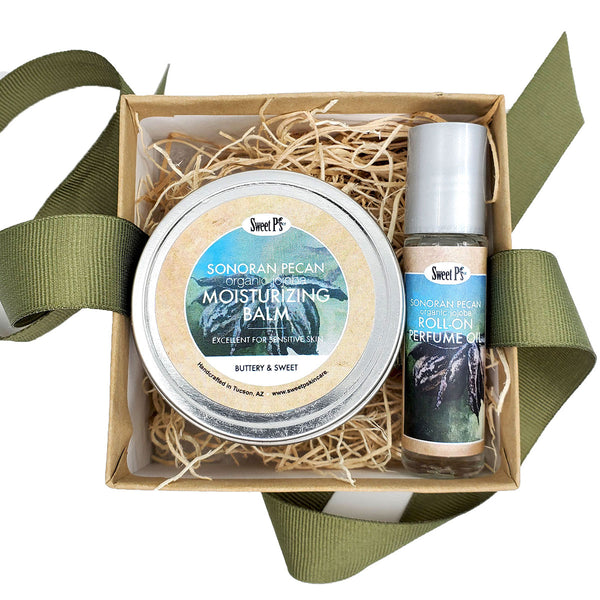 Organic jojoba oil roll on perfume with organic jojoba and shea butter moisturizing balm in a cute gift box