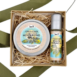 Citrus and sage gift set. This set contains a moisturizing balm and a roll on perfume oil. Both are made with certified organic jojoba oil and are cruelty free.