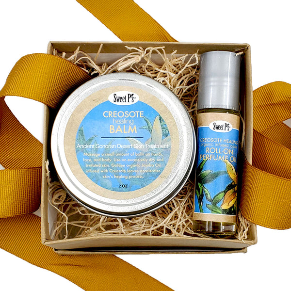 Small, 2 piece gifts set contains creosote healing balm and creosote roll-on perfume. Both are infused with creosote leaves that were wild harvested from the sonoran desert in tucson, arizona