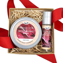 Perfect pair gift set contains organic christmas cactus moisturizing balm and jojoba perfume oil